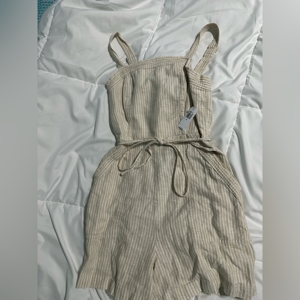 tan old navy sleeveless romper with pockets and belt